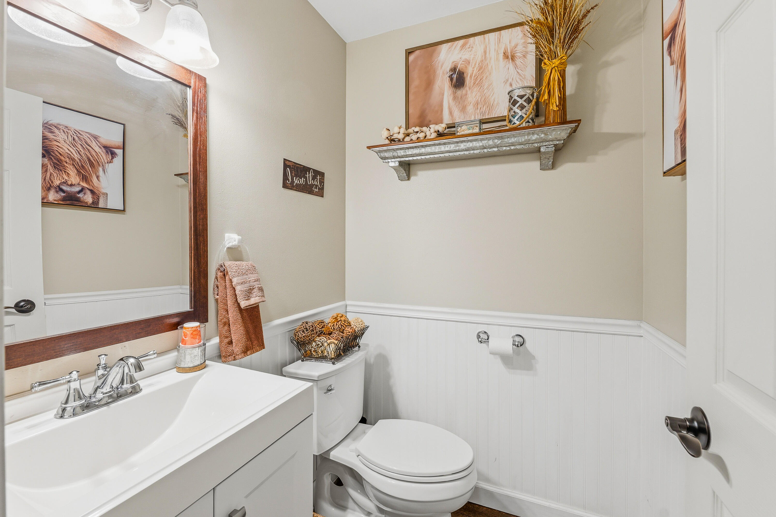 34899 Pabst Road Summit, WI 53066 - Photo 32 of 38 A half bath tucked away near the garage and mudroom—convenient, practical, and right where you need it.