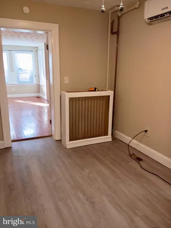 a stove top oven sitting inside of a kitchen