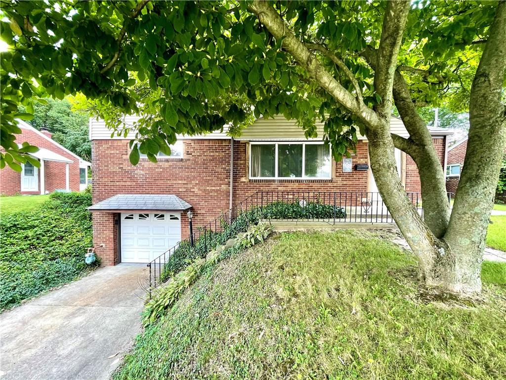 1010 5th Street Baden, PA 15005 - Photo 2 of 21 front view of a house with a yard