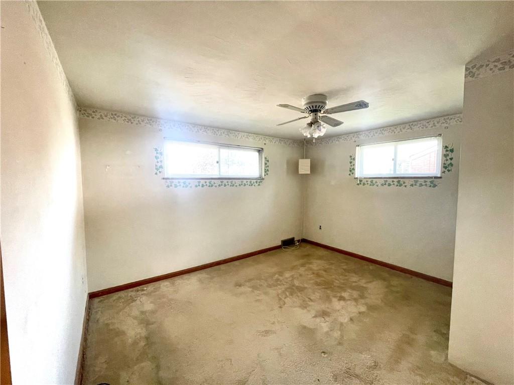 1010 5th Street Baden, PA 15005 - Photo 12 of 21 an empty room with windows and fan