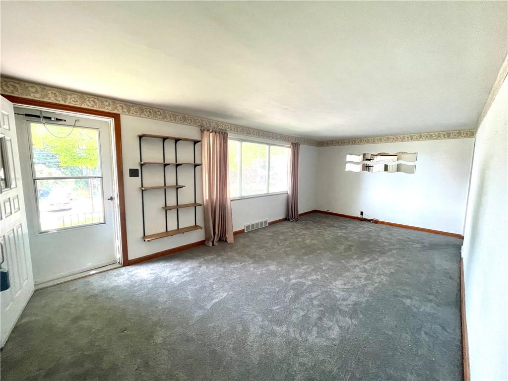 1010 5th Street Baden, PA 15005 - Photo 3 of 21 an empty room with windows