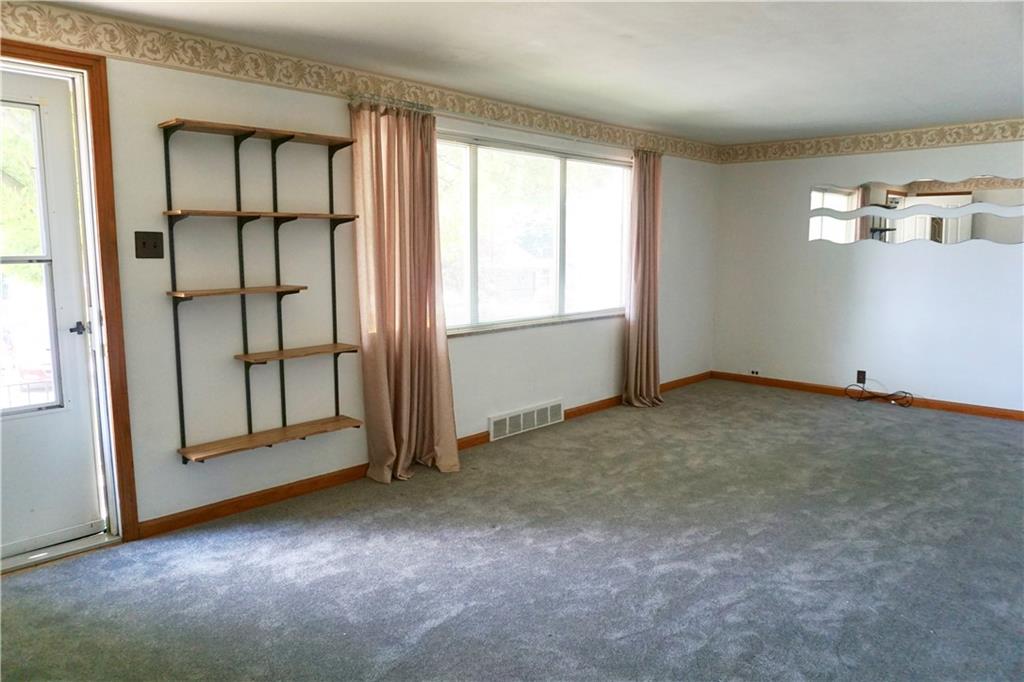 1010 5th Street Baden, PA 15005 - Photo 4 of 21 an empty room with windows and closet