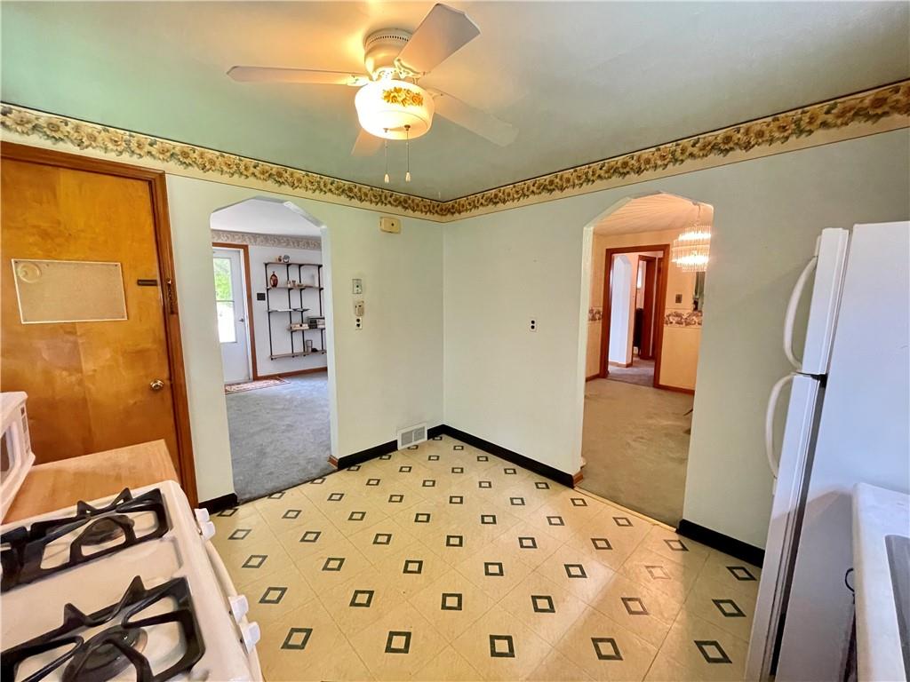 1010 5th Street Baden, PA 15005 - Photo 9 of 21 a view of a hallway with wooden floor and a bathroom