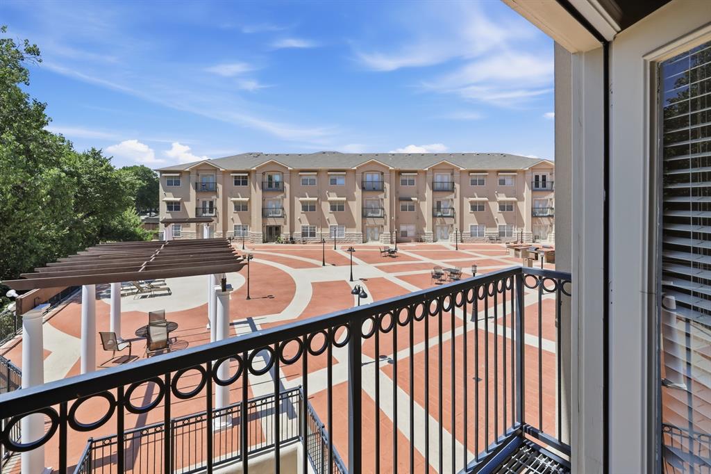 3102 Kings Road, Unit 2212 Dallas, TX 75219 - Photo 10 of 30 a view of a large building from a balcony