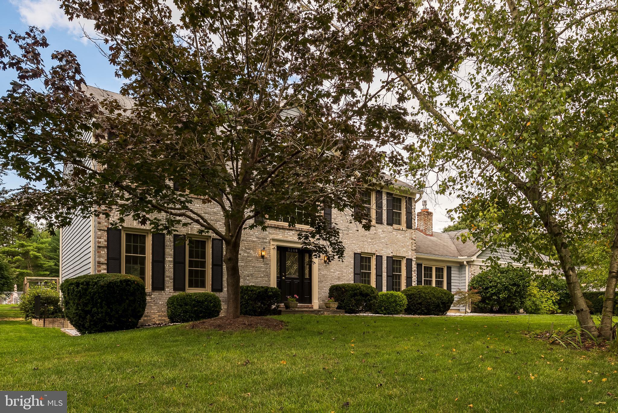 5208 Durham Road East Columbia, MD 21044 - Photo 34 of 36 a front view of a house with a garden