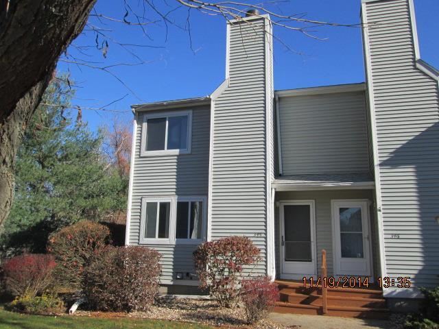 70 Old Town Road, Unit 345 Vernon, CT 06066 - Photo 1 of 1 a front view of a house with garden