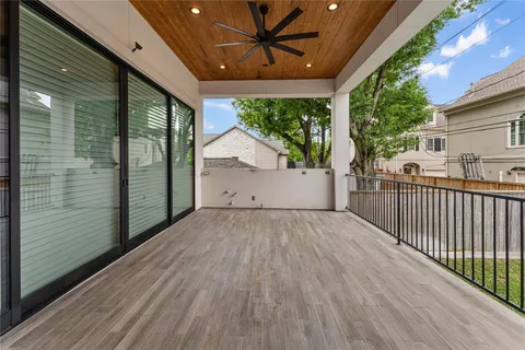 a living room with furniture window and wooden floor