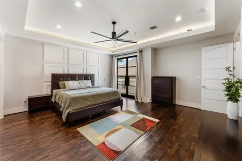 a spacious bathroom with double sink and a mirror