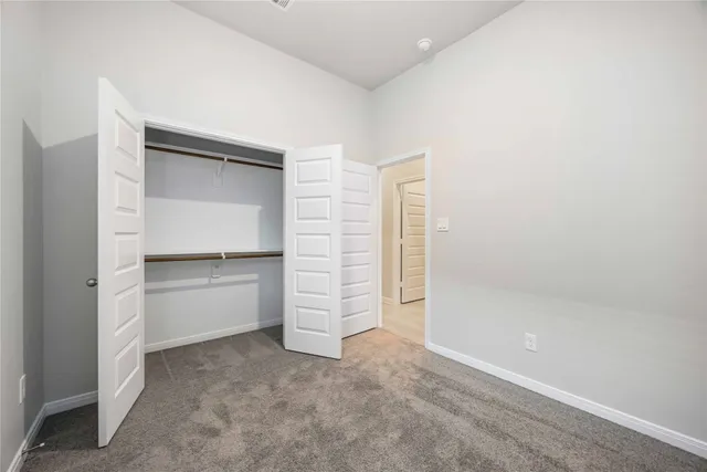 a view of walk in closet with cabinet