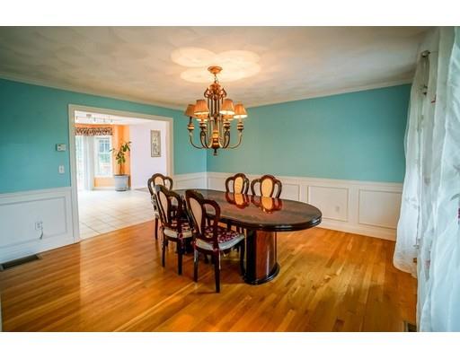 18 Cobblestone Way Billerica, MA 01862 - Photo 13 of 30 a view of a dining room with furniture and a chandelier