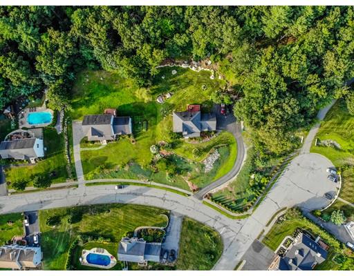 18 Cobblestone Way Billerica, MA 01862 - Photo 2 of 30 an aerial view of a house with a yard basket ball court and outdoor seating