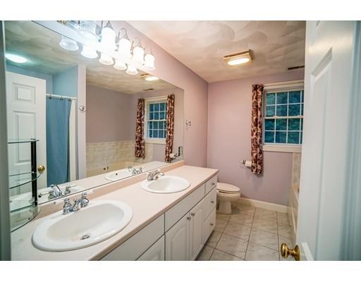18 Cobblestone Way Billerica, MA 01862 - Photo 24 of 30 a bathroom with a sink double vanity and a mirror