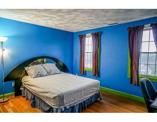 18 Cobblestone Way Billerica, MA 01862 - Photo 26 of 30 a bedroom with a bed a mirror and window