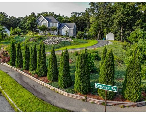 18 Cobblestone Way Billerica, MA 01862 - Photo 4 of 30 a front view of a house with a garden