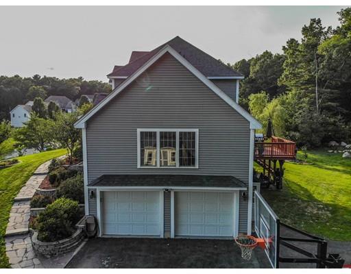 18 Cobblestone Way Billerica, MA 01862 - Photo 5 of 30 a front view of house with yard and trees in the background