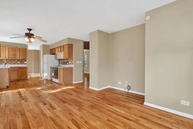 a view of kitchen with wooden floor