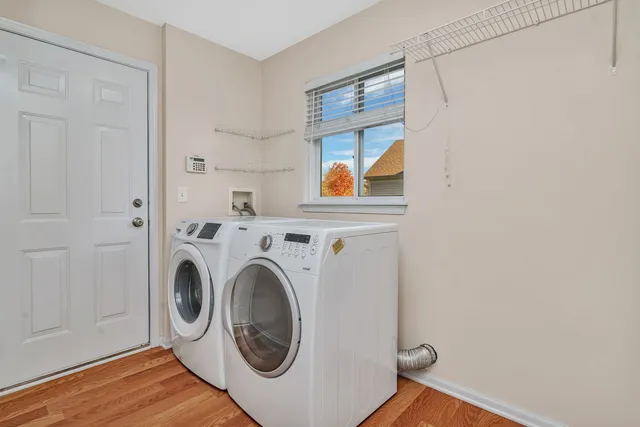a utility room with dryer and washer