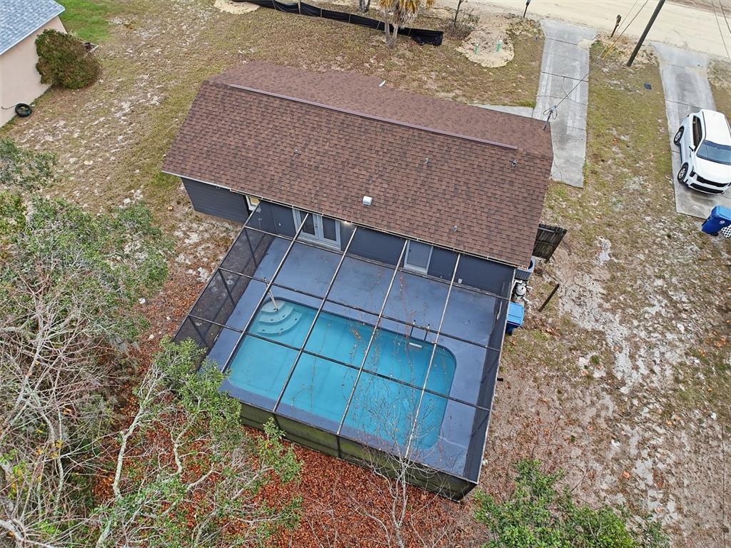 6211 Lorraine Lane Spring Hill, FL 34608 - Photo 26 of 28 a backyard of a house