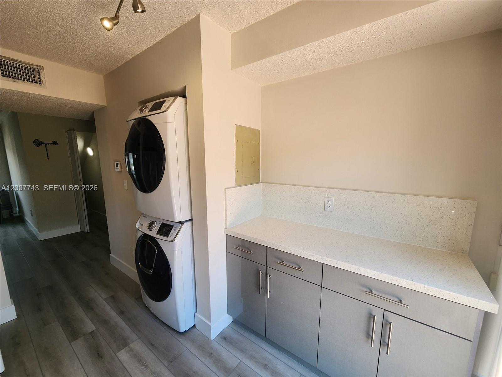 15250 Southwest 80th Street, Unit 4 Miami, FL 33193 - Photo 4 of 18 a utility room with dryer and washer