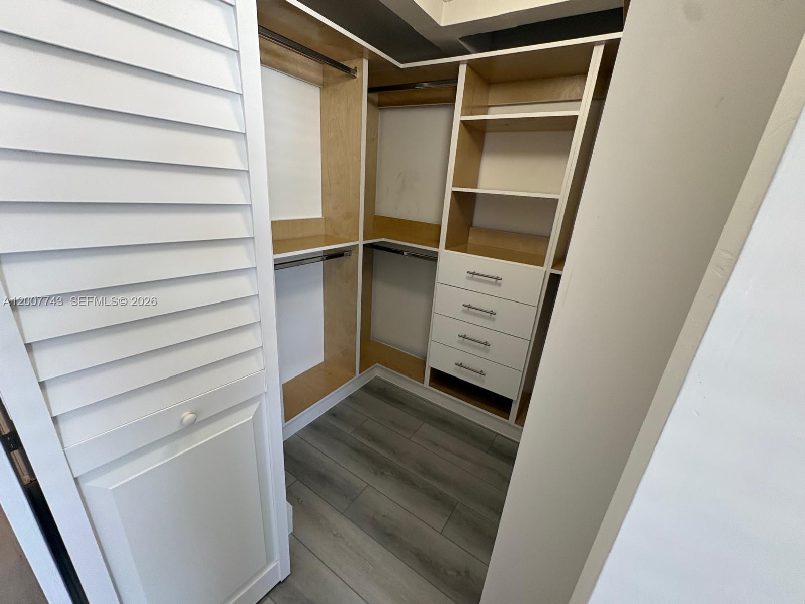 15250 Southwest 80th Street, Unit 4 Miami, FL 33193 - Photo 10 of 18 a view of walk in closet