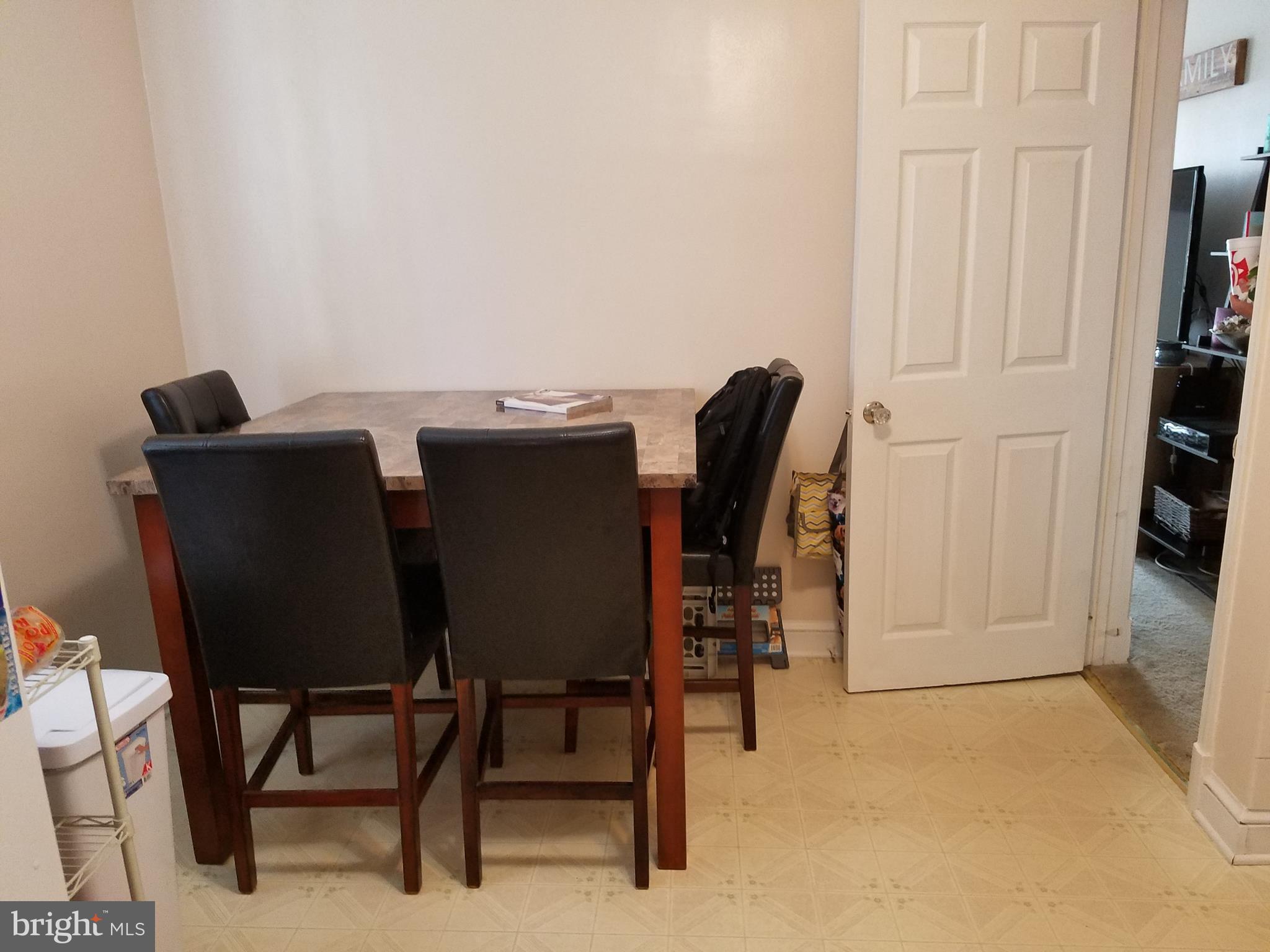 5561 Ashbourne Road Halethorpe, MD 21227 - Photo 6 of 21 a view of a workspace with furniture