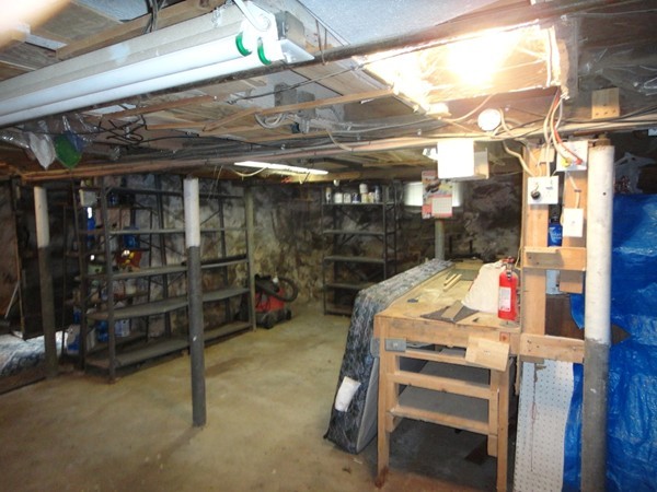 89 Spring Street Fairhaven, MA 02719 - Photo 17 of 27 a view of store room with racks