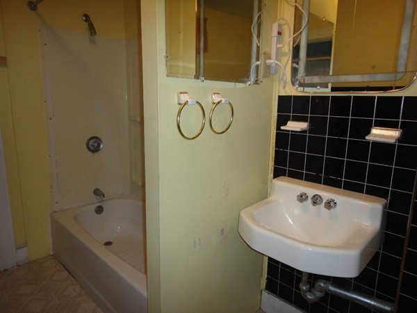89 Spring Street Fairhaven, MA 02719 - Photo 23 of 27 a bathroom with a sink a toilet and shower