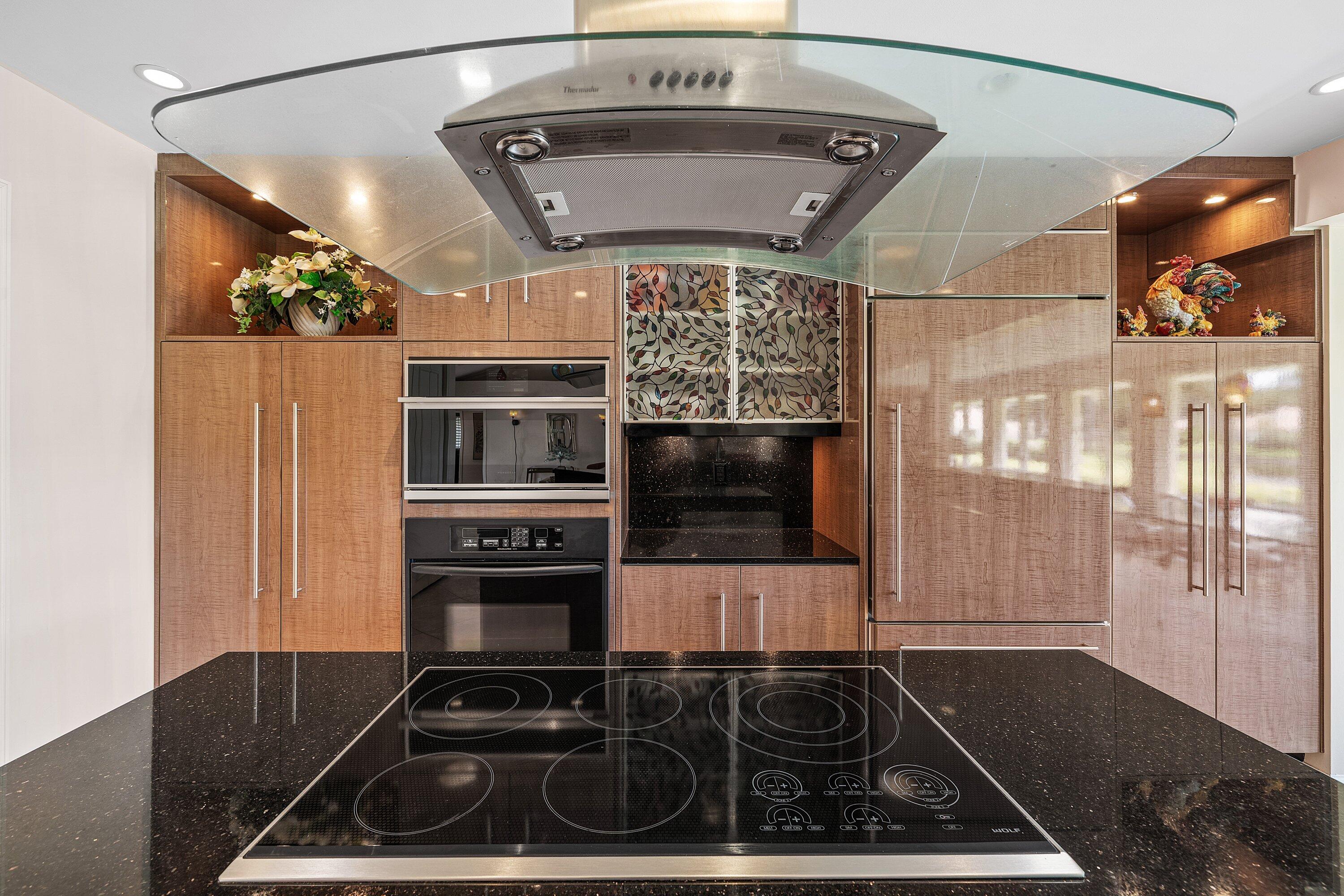 4365 Shell Drake Lane Boynton Beach, FL 33436 - Photo 16 of 56 a stove top oven sitting inside of a kitchen