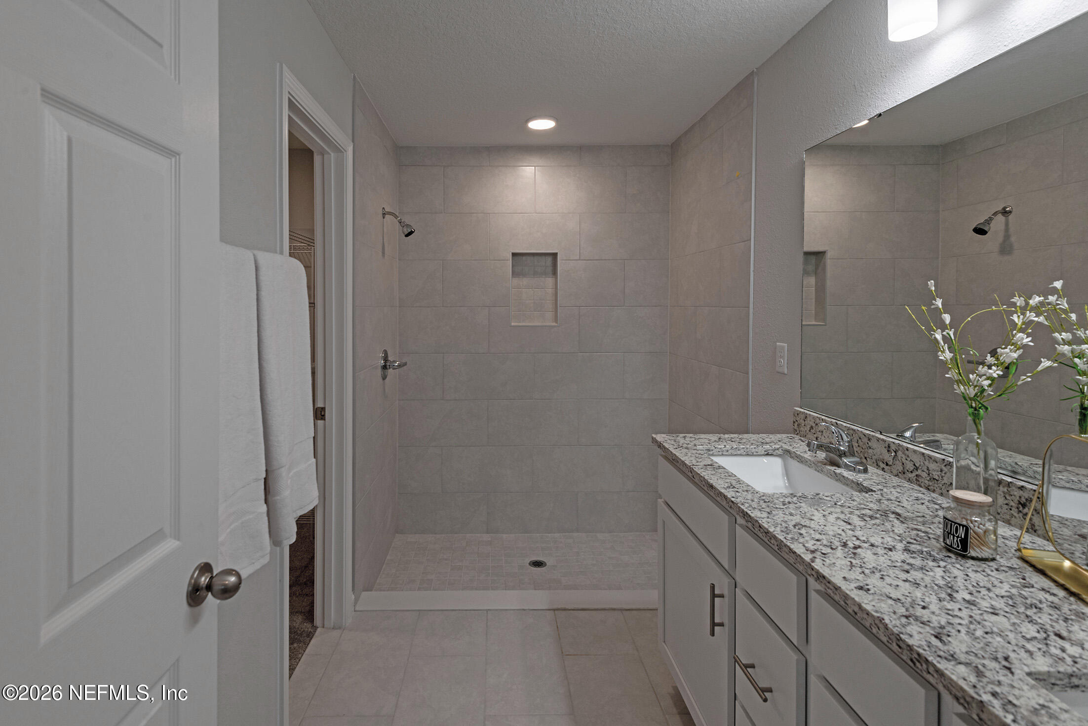 13748 Coman Road Jacksonville, FL 32218 - Photo 19 of 34 a bathroom with a granite countertop sink mirror and double