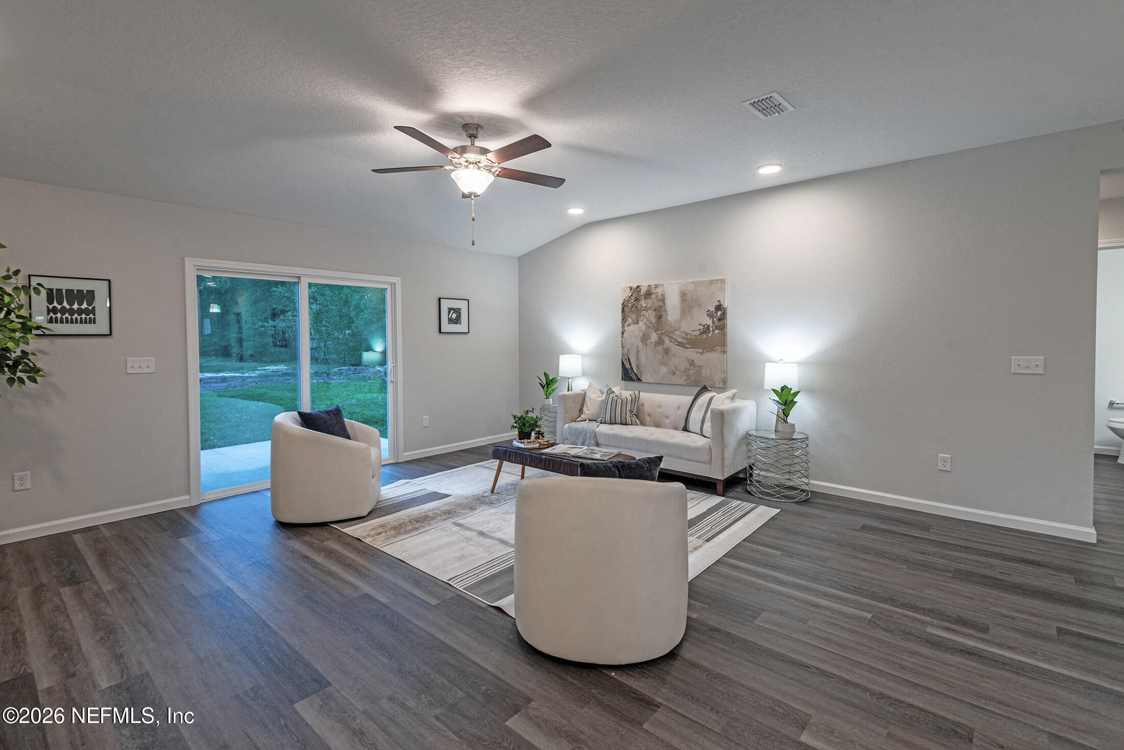 13748 Coman Road Jacksonville, FL 32218 - Photo 22 of 34 a living room with furniture and a large window