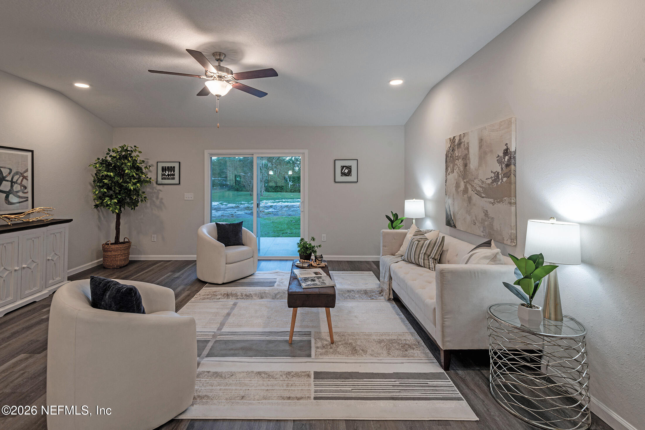 13748 Coman Road Jacksonville, FL 32218 - Photo 24 of 34 a living room with furniture and a large window