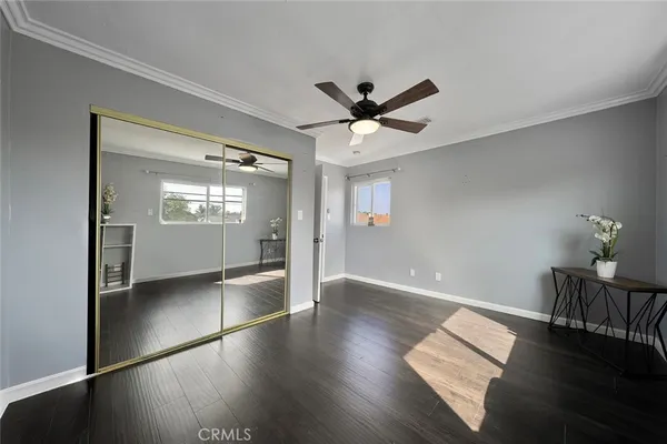a view of an empty room and glass door