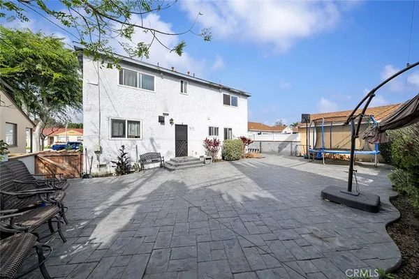 a view of a back yard of the house