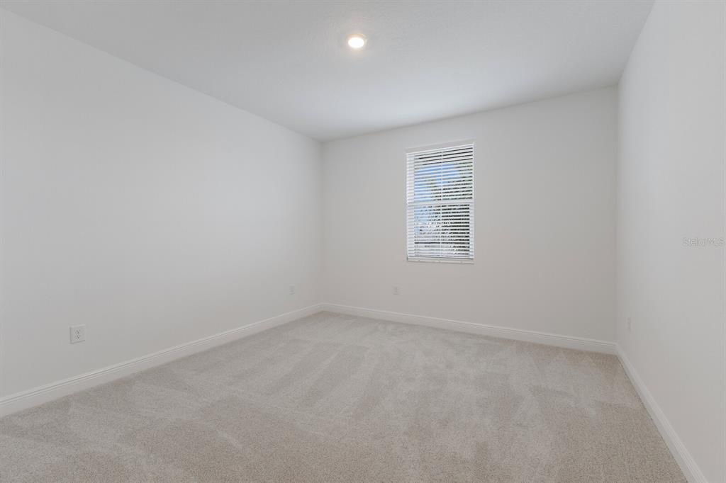 4611 Sweet Retreat Run Lakewood Ranch, FL 34211 - Photo 29 of 37 an empty room with a window
