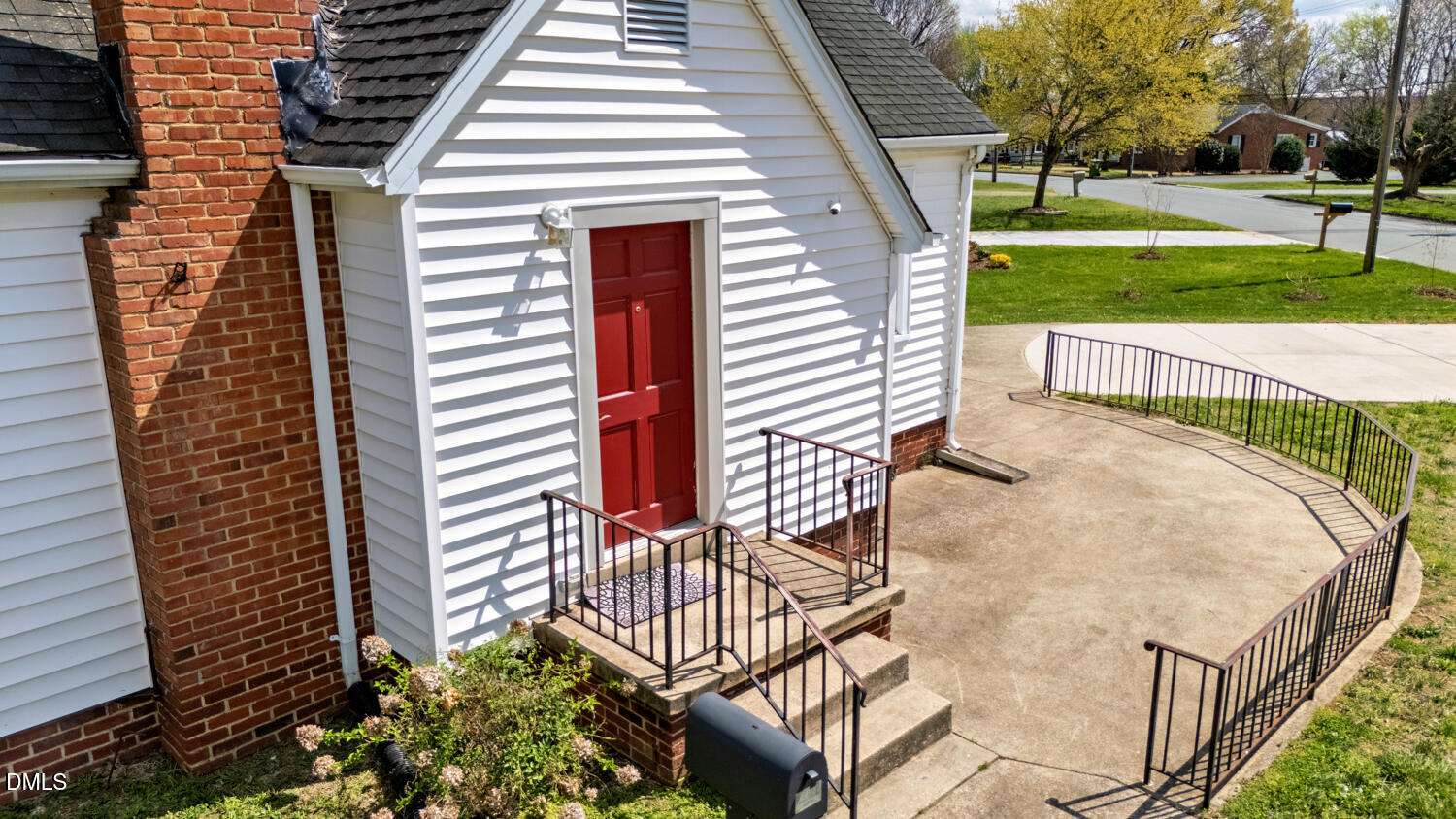 414 South Maple Street Graham, NC 27253 - Photo 2 of 42 a view of a patio with a yard