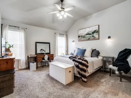 a kitchen with stainless steel appliances granite countertop a refrigerator sink and stove