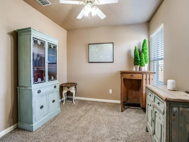 a bathroom with a bathtub a sink and a mirror