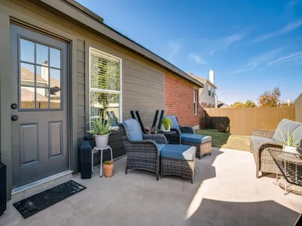a bathroom with a sink a toilet and shower curtain