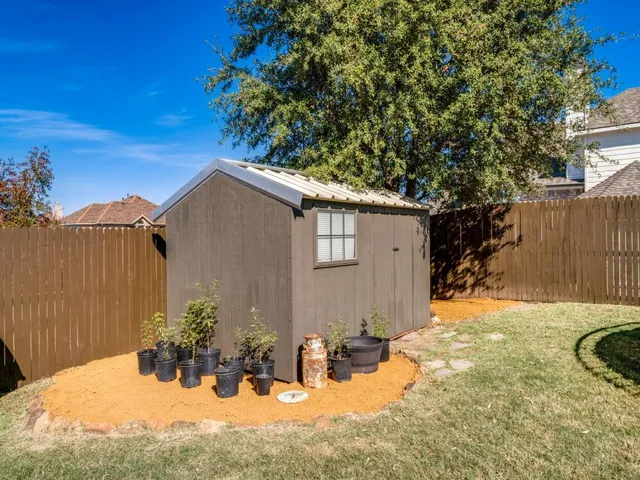 a view of a house with a swimming pool
