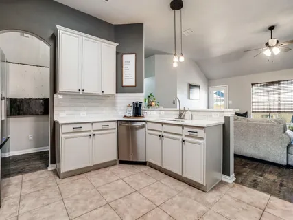 a view of a yard with swimming pool