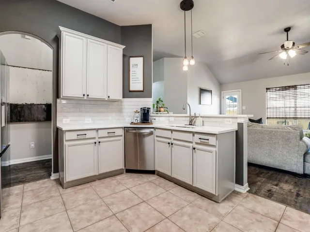 a view of a yard with swimming pool