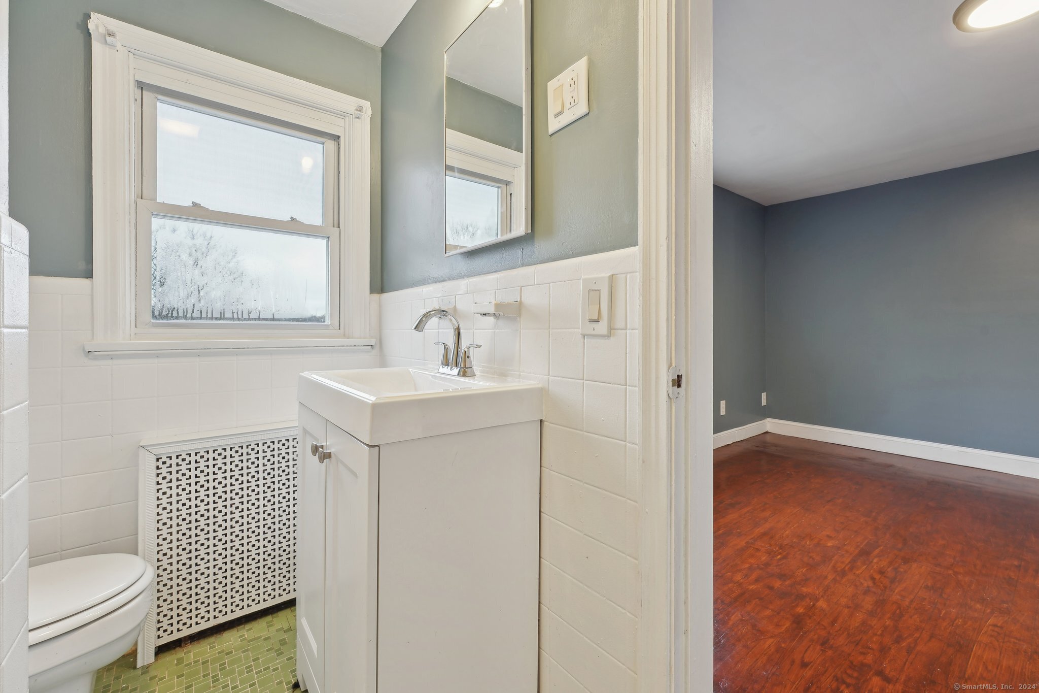 59 High Street Derby, CT 06418 - Photo 19 of 29 a bathroom with a sink toilet and shower