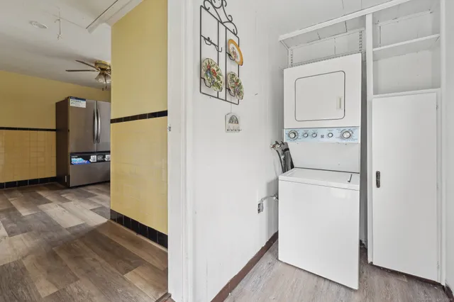 a view of a storage & utility room with washer and dryer