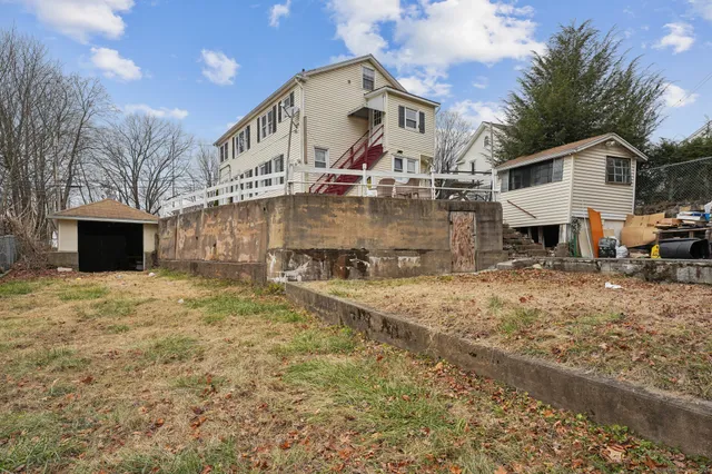 a front view of a house with a garage