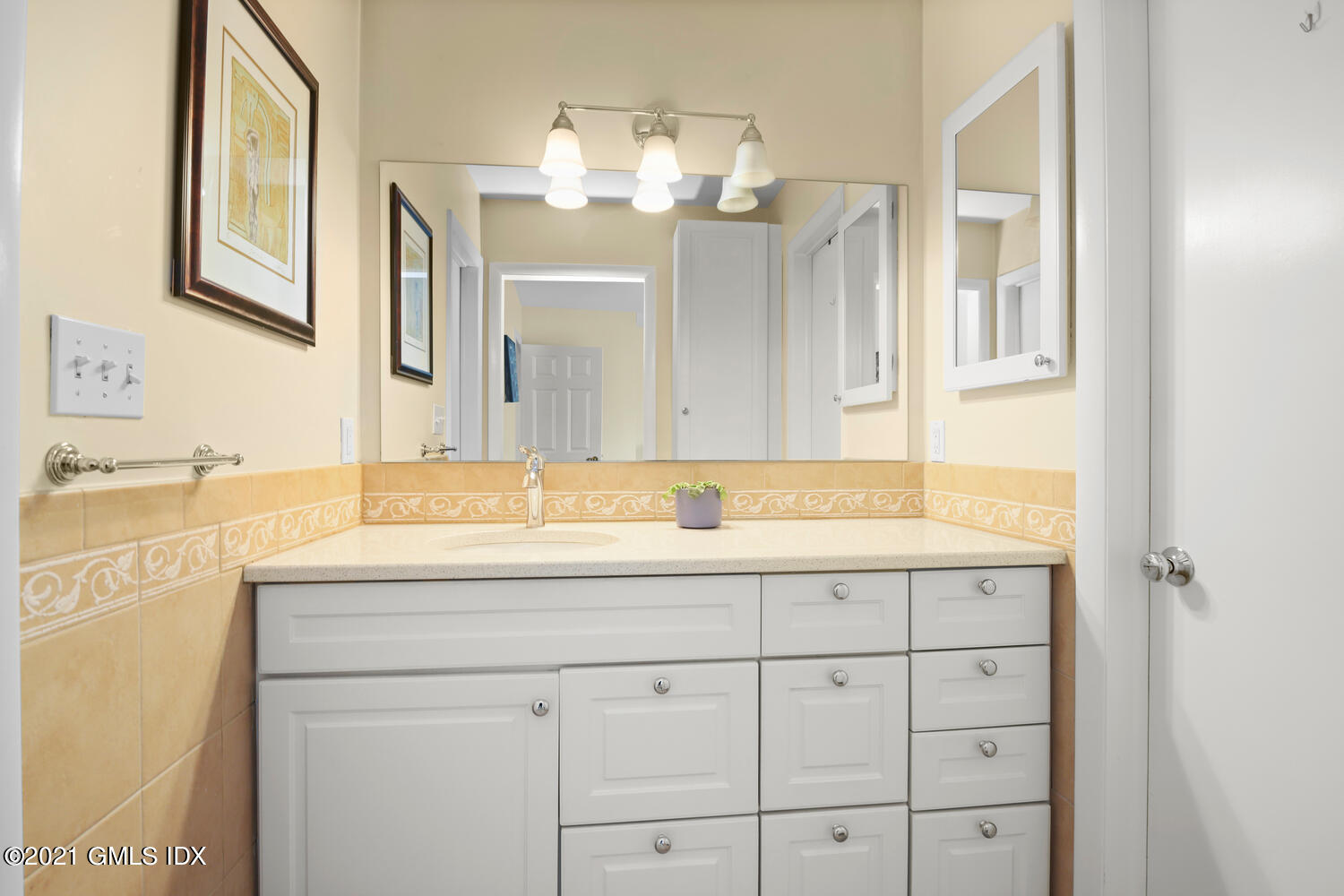 3 Whiffletree Way, Unit 3 Riverside, CT 06878 - Photo 11 of 24 a bathroom with a sink and a mirror