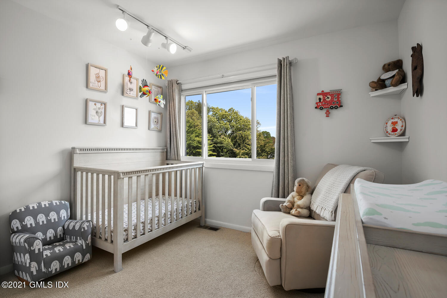 3 Whiffletree Way, Unit 3 Riverside, CT 06878 - Photo 13 of 24 a bedroom with a bed and a window