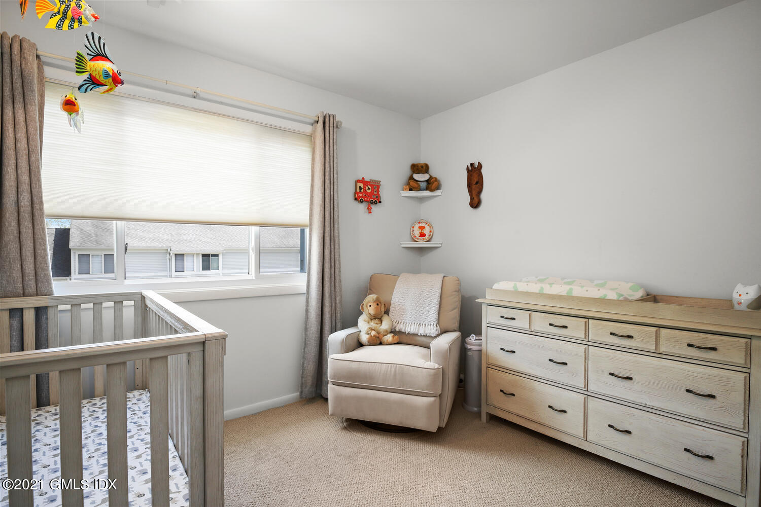 3 Whiffletree Way, Unit 3 Riverside, CT 06878 - Photo 14 of 24 a bedroom with furniture and a window
