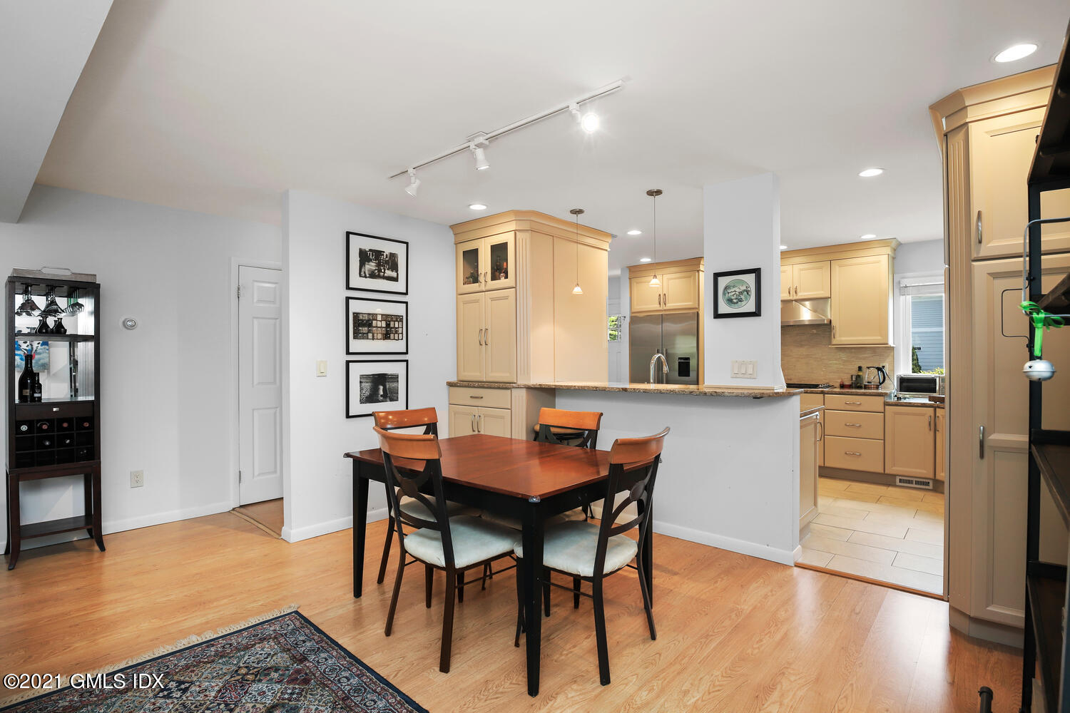 3 Whiffletree Way, Unit 3 Riverside, CT 06878 - Photo 7 of 24 a view of a dining room with furniture and wooden floor