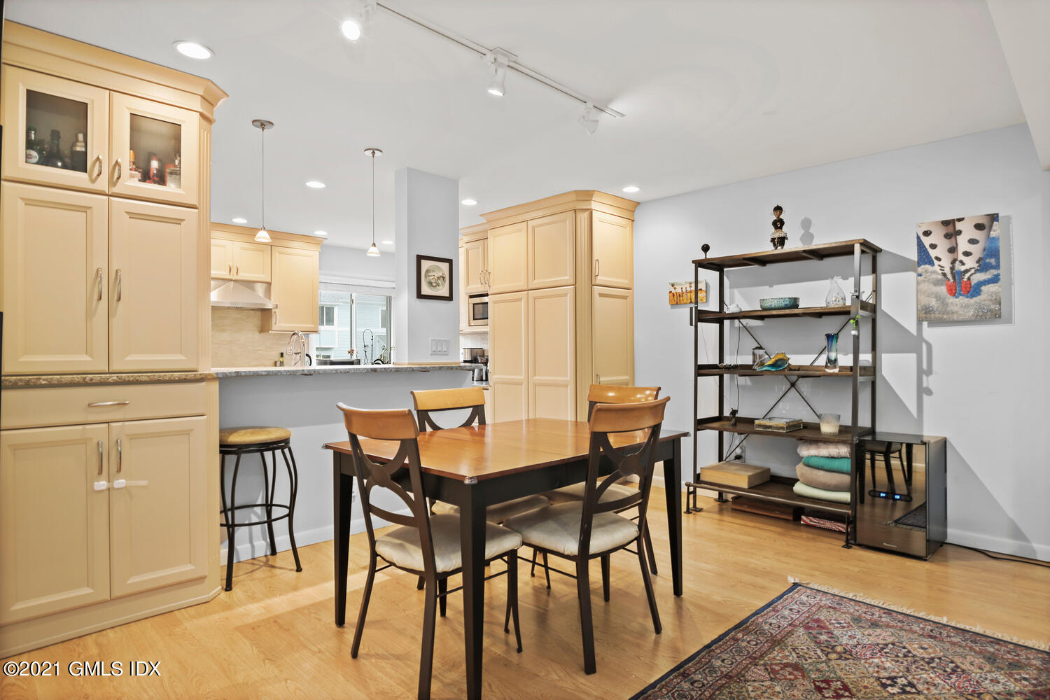 3 Whiffletree Way, Unit 3 Riverside, CT 06878 - Photo 8 of 24 a dining room with furniture and wooden floor