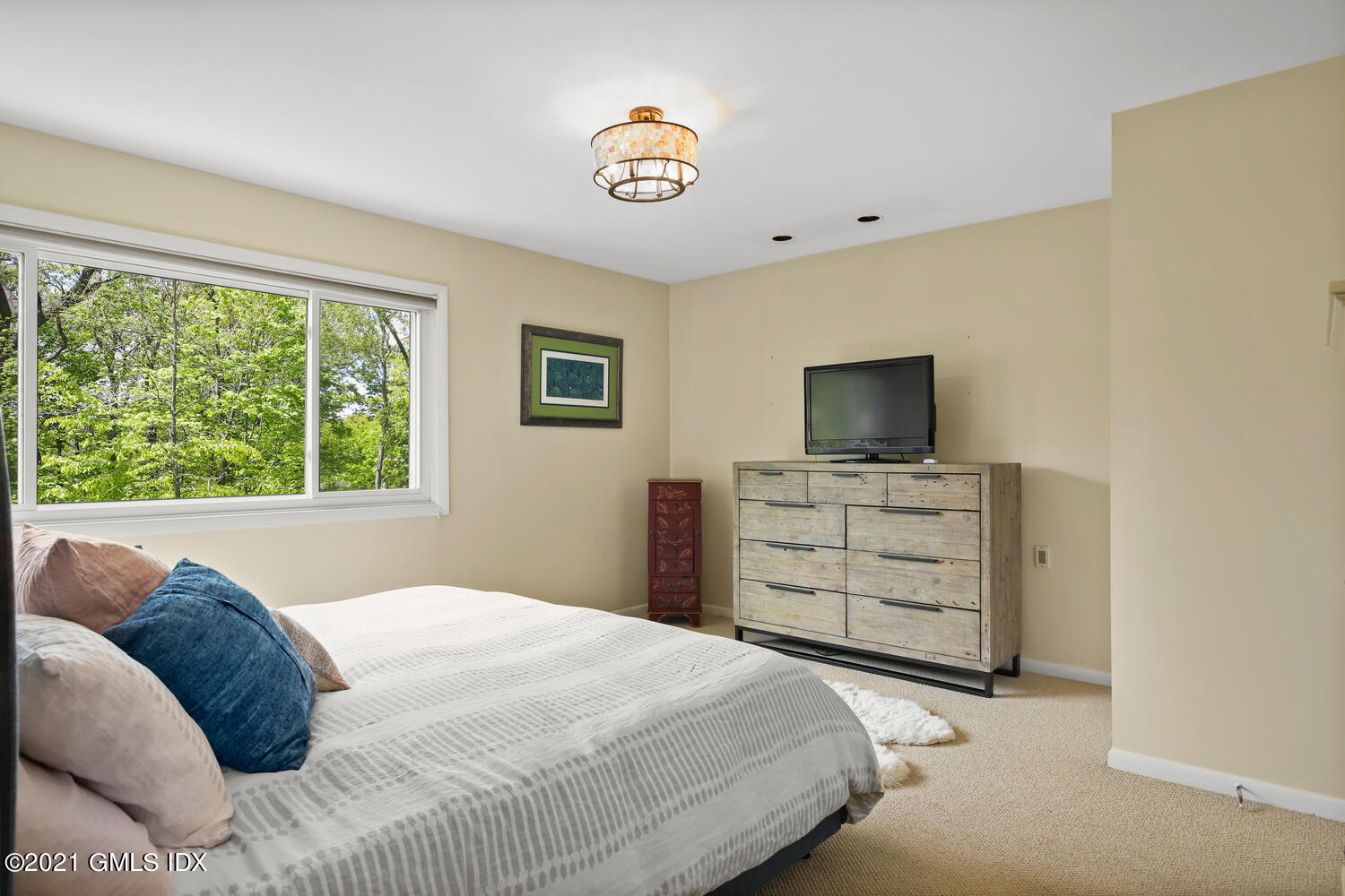 3 Whiffletree Way, Unit 3 Riverside, CT 06878 - Photo 10 of 24 a bedroom with a bed and furniture